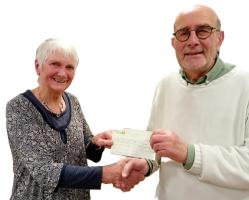 Karilyn receiving cheque presentation